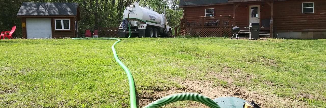 Hose going into septic reservoir 